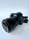 Nikon D3100 Digital Camera W/ 18-135MM Lens, Sd Card, Carry Case, Manuals. Fixed Price $149.00.