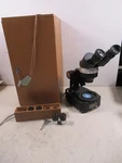 Vintage Wolfe Binocular Stereo Microscope With Wooden Case And Eyepieces. Fixed Price $249.95.