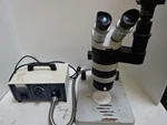 Edmunds Scientific Wild M7 Heerbrugg Swiss Made Optical Stereo Microscope + Lamp. Fixed Price $1589.00.