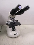 Wolfe Contour 59-0986 Binocular Microscope With 4 Objective Lenses & Eyepieces. Fixed Price $249.95.