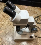 Accu-scope Microscope With 2 Eyepieces WF10X. Fixed Price $129.99.