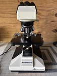 Fisher Scientific 12-561B Microscope W/ PL4/0.1,PL10/0.25,PL 40/0.65,PL 100/1.25. Fixed Price $99.00.
