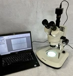 Amscope 7X-45X Led Trinocular Stereo Zoom Microscope 5MP Camera + Reticule. Fixed Price $785.00.