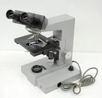 Ernst Leitz Sm-lux Binocular Microscope W/ 10X Objective. Fixed Price $189.00.