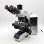 Olympus Microscope BX53 With Fluorites, Phase Contrast, And Trinocular Head. Fixed Price $8450.00.