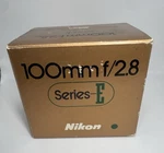 Nikon Series 100MM F/2.8 Ais Lens - Mint Original Gold Box Super Clean. Fixed Price $125.00.