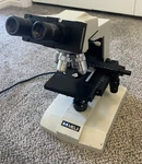 Meiji ML2000 Binocular Microscope 4X 10X 40X 100X Japan Mechanical Stage. Fixed Price $349.00.