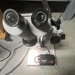 Omano Binocular Stereo Microscope With Scienscope IL-LED-R2 Light Source. Fixed Price $385.00.