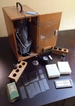 Unitron Mus Student Microscope - Case, Lenses, Keys, Glass Slides, Instructions. Fixed Price $88.15.