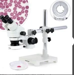 Amscope 3.5X-45X Binocular Stereo Zoom Microscope With Double Arm Boom Stand. Fixed Price $525.00.