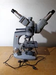 American Optical 10-118 Series Microscope W Dual Head Objectives 1460X. Fixed Price $225.00.