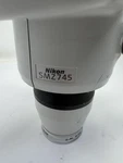 Nikon SMZ745 Microscope With 10X Eyepieces, And 0.5X Auxiliary Lens. Fixed Price $749.00.