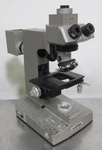 T182086 Olympus Vanox Trinocular Microscope Body W/ Vertical Illuminator. Fixed Price $500.00.