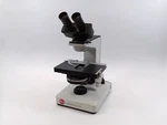 Leitz 020-435.025 Laborlux 12 Microscope, No Optics W/ Periplan 10X/18. Fixed Price $715.04.