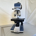 Amscope Binocular Compound Microscope Lot- Eye Pieces, Camera, Petri Dishes. Fixed Price $225.00.