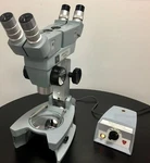 American Optical Cycloptic Dual Head Microscope 56C-103 W Light Source. Fixed Price $888.00.