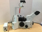 Olympus Model IX70-S8F2 Inverted Microscope Base & TL4 Light Controller. Fixed Price $1354.99.